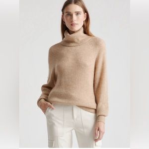 Camel turtleneck wool blend sweater.